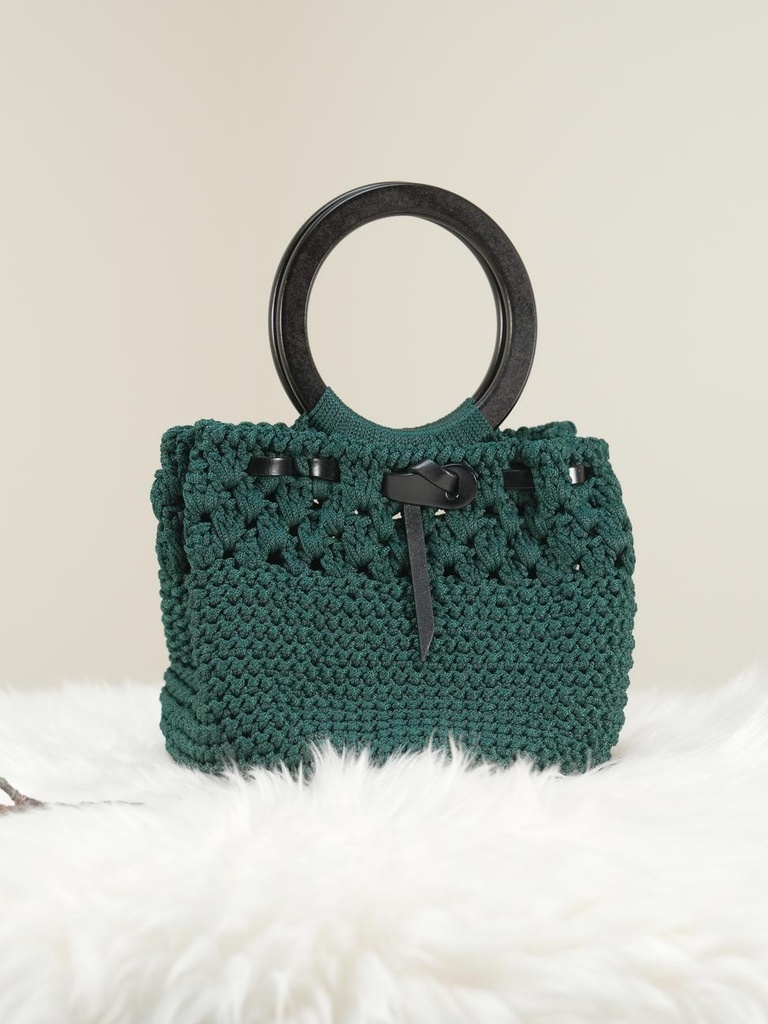 Green Crochet Handbag with Black Circular Handle and Leather Bow Detail