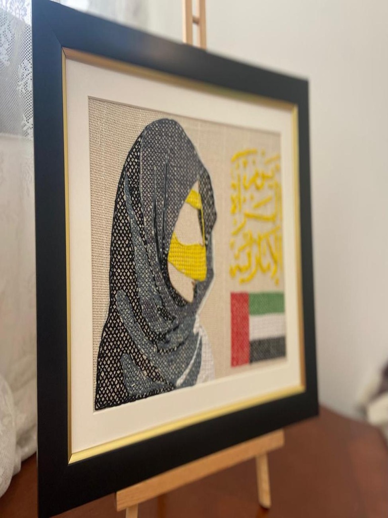 "Emirati Woman with Golden Burqa and UAE Flag