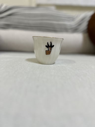 White smoker with brown deer logo