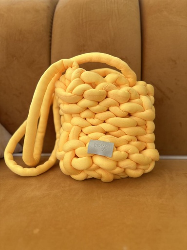 yellow buffy bag